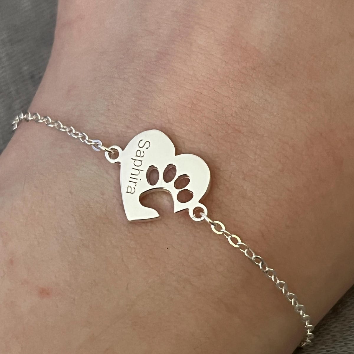 Customer photo review of Custom Paw & Heart Name Bracelet