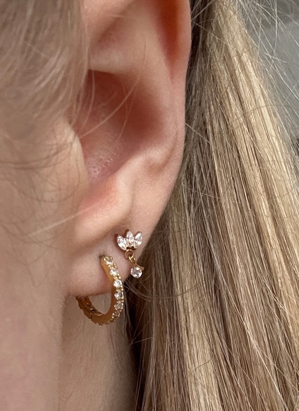 Customer photo review of Tiny Dangle Lotus Labret Piercing - Titan