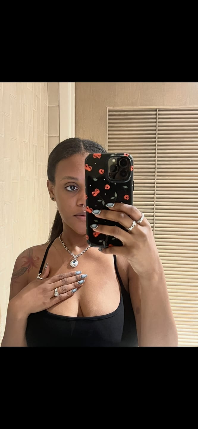 Customer photo review of EVIL EYE PENDANT
