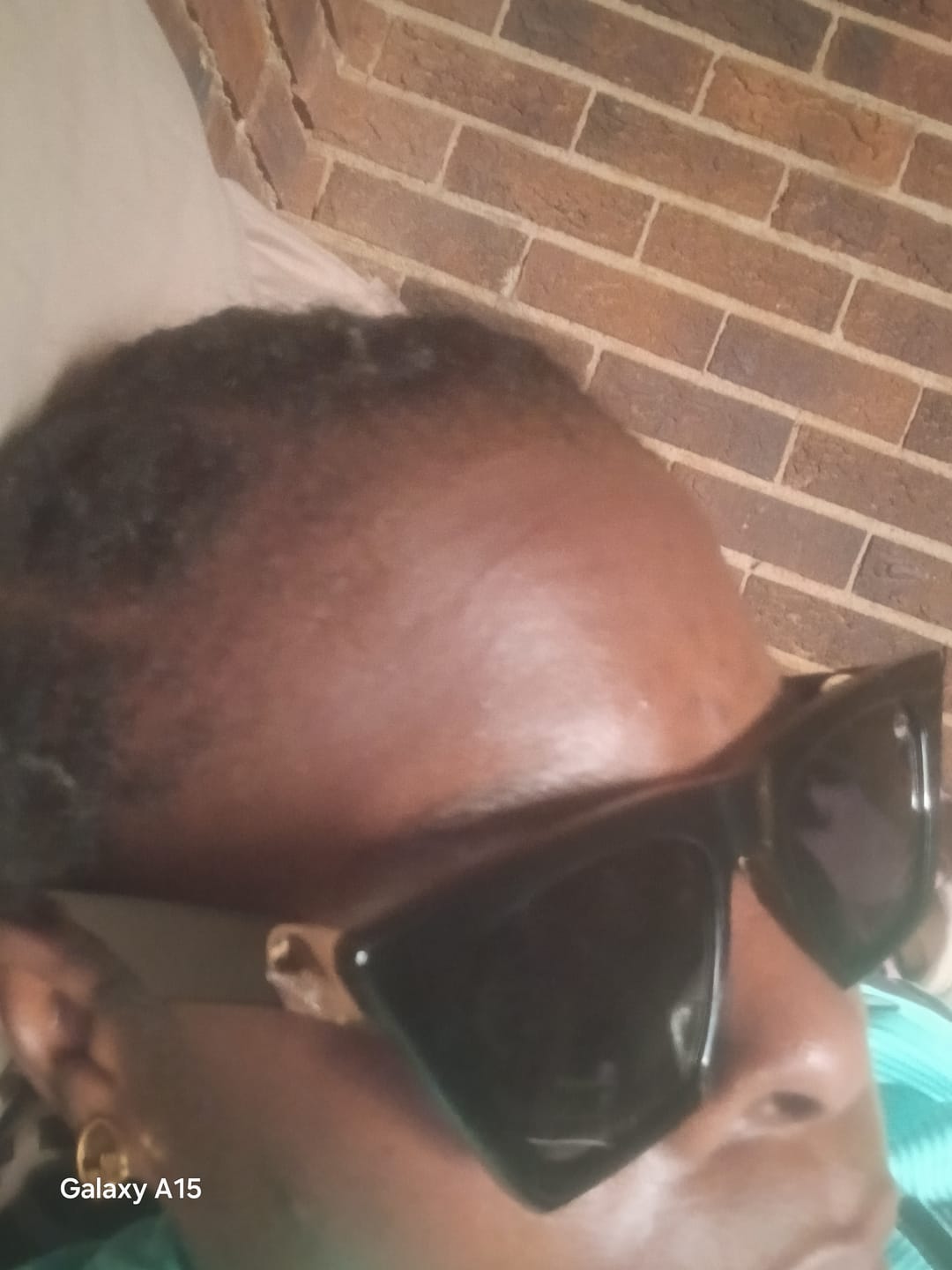 Customer photo review of Black Diva Logo Sunglasses