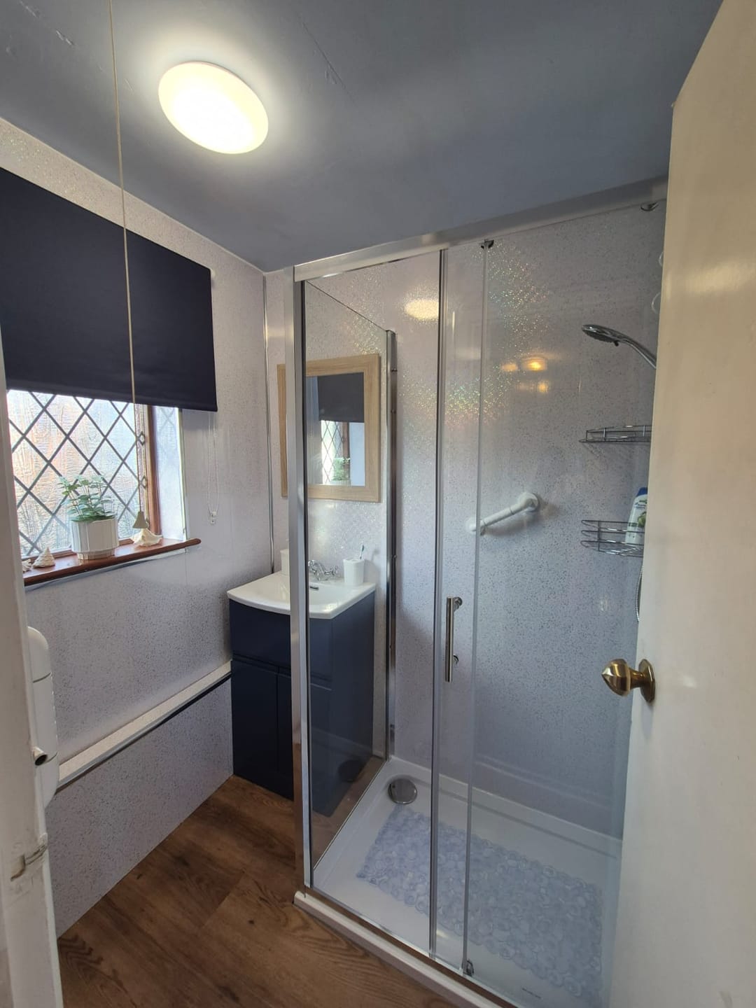Customer photo review of 8mm Platinum White Sparkle Bathroom Wall Panel 2.6M