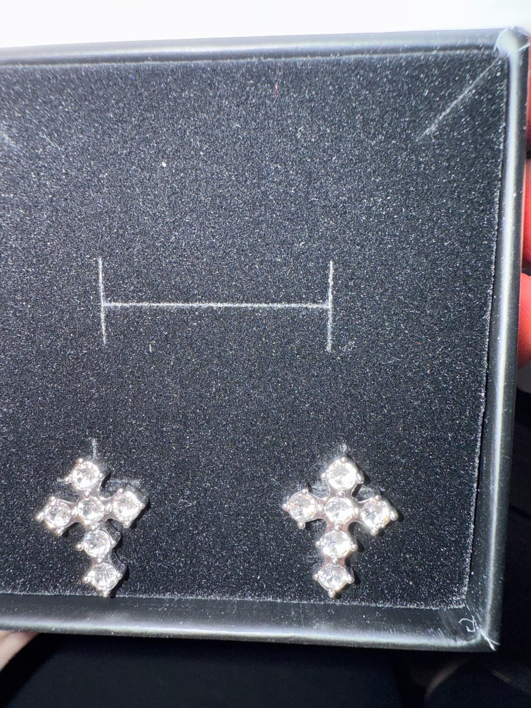 Customer photo review of Marissa 18k White Gold Plated Cross Stud Earrings with Swarovski Crystals