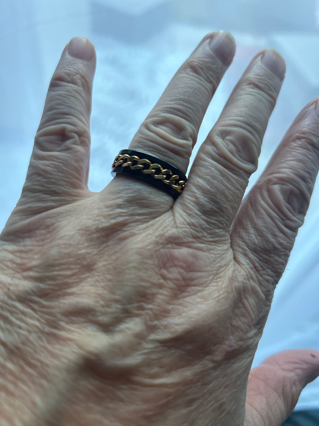 Customer photo review of Black with Gold Rotating Chain 8mm Wonder Ring