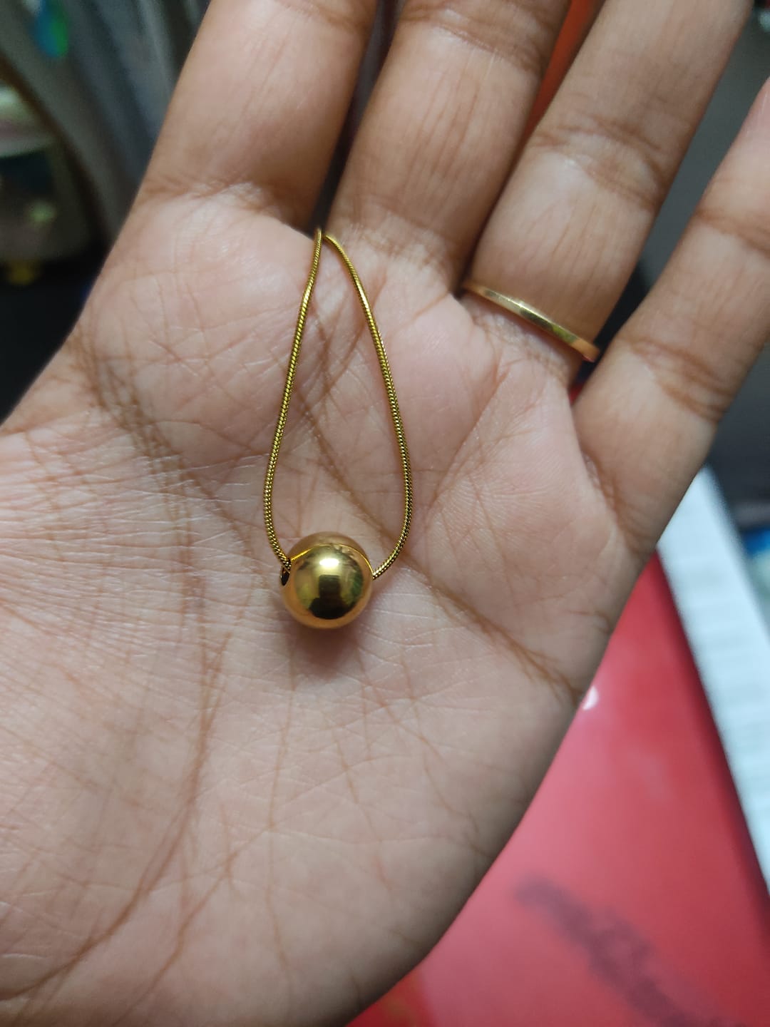 Customer photo review of Tiny Horn Necklace