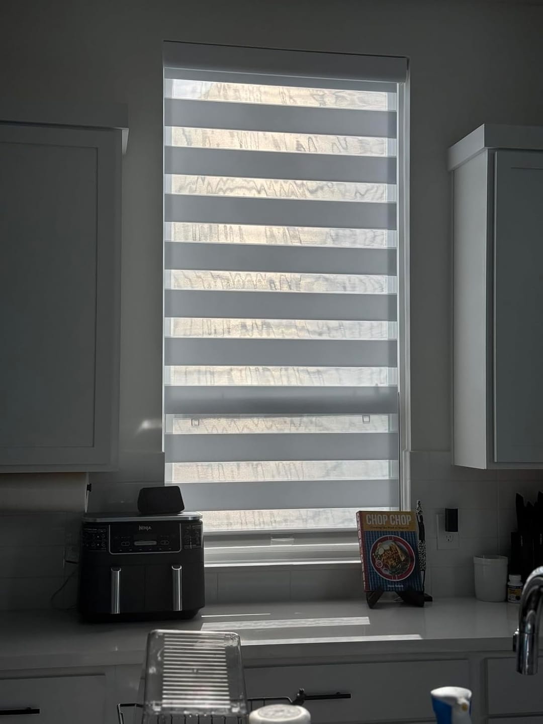 Customer photo review of Bringnox No Drill Motorized Zebra Roller Blinds 100% Blackout
