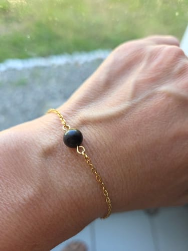 Customer photo review of Bracelet à perle d'obsidienne dorée en acier inoxydable