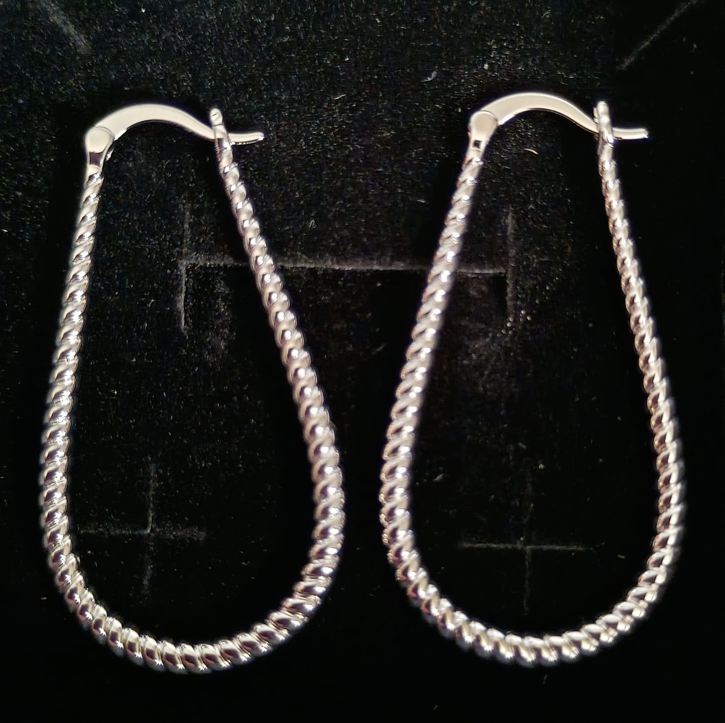 Customer photo review of Angelica 18k White Gold Plated 45mm Twisted U-Shaped Hoop Earrings