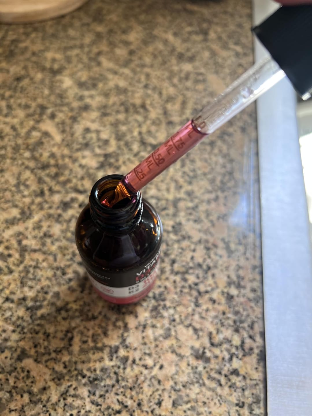 Customer photo review of Vitamin D3 10000 IU Plus K2 (MK-7) - Strawberry Flavor - 200 mcg Liquid Drops