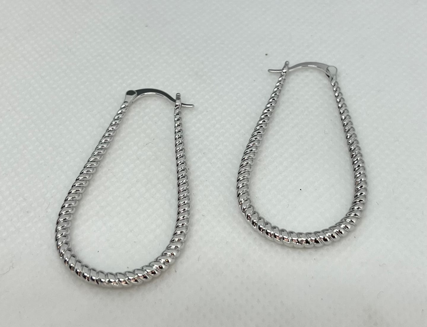 Customer photo review of Angelica 18k White Gold Plated 45mm Twisted U-Shaped Hoop Earrings