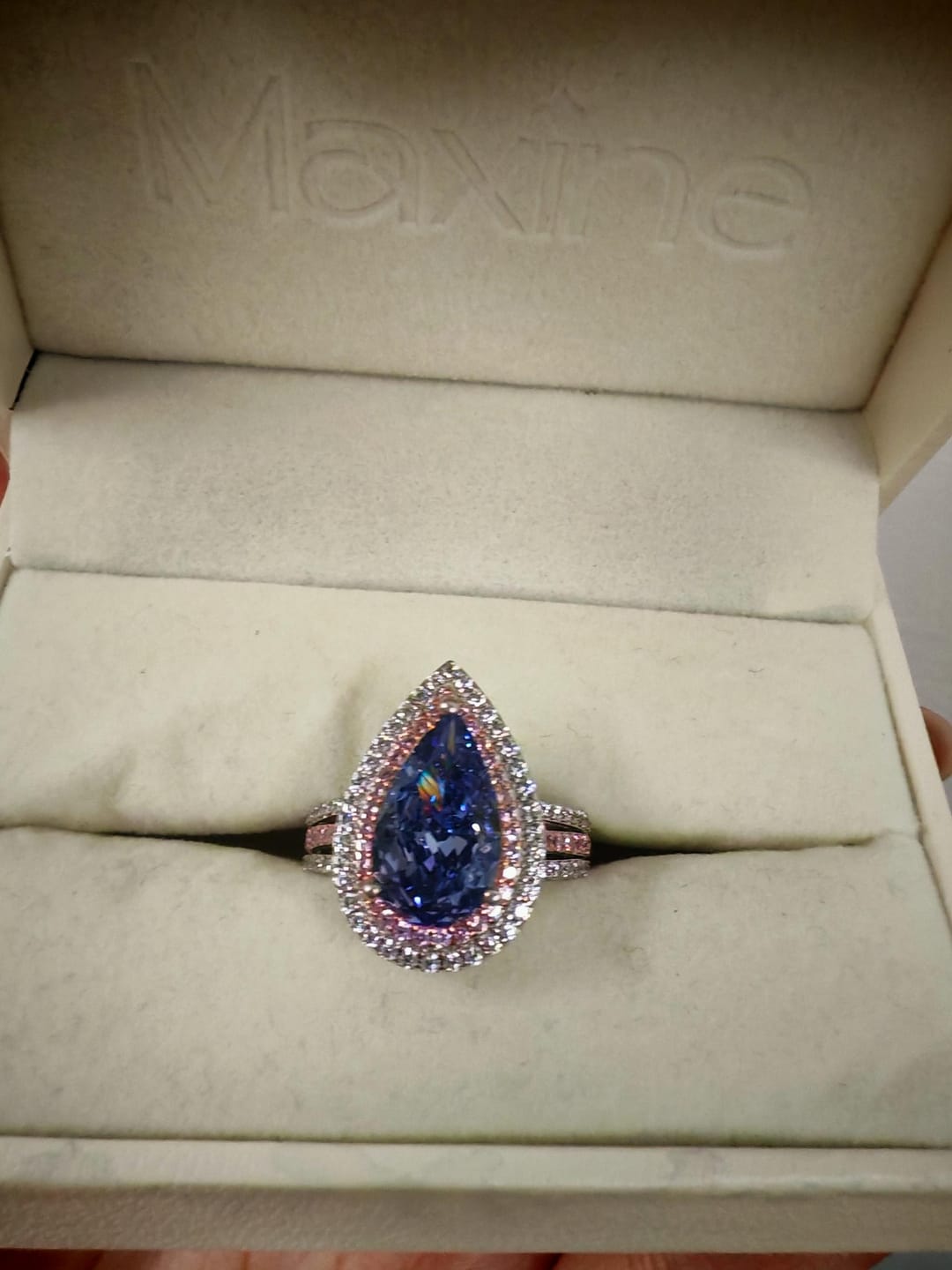 Customer photo review of Louily Luxurious Double Halo Pear Cut Aquamarine Blue/Purple Engagement Ring In Sterling Silver