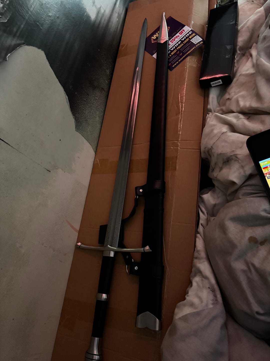 Customer photo review of Lord Of The Rings - Deluxe Handforged Damascus Steel Strider Sword