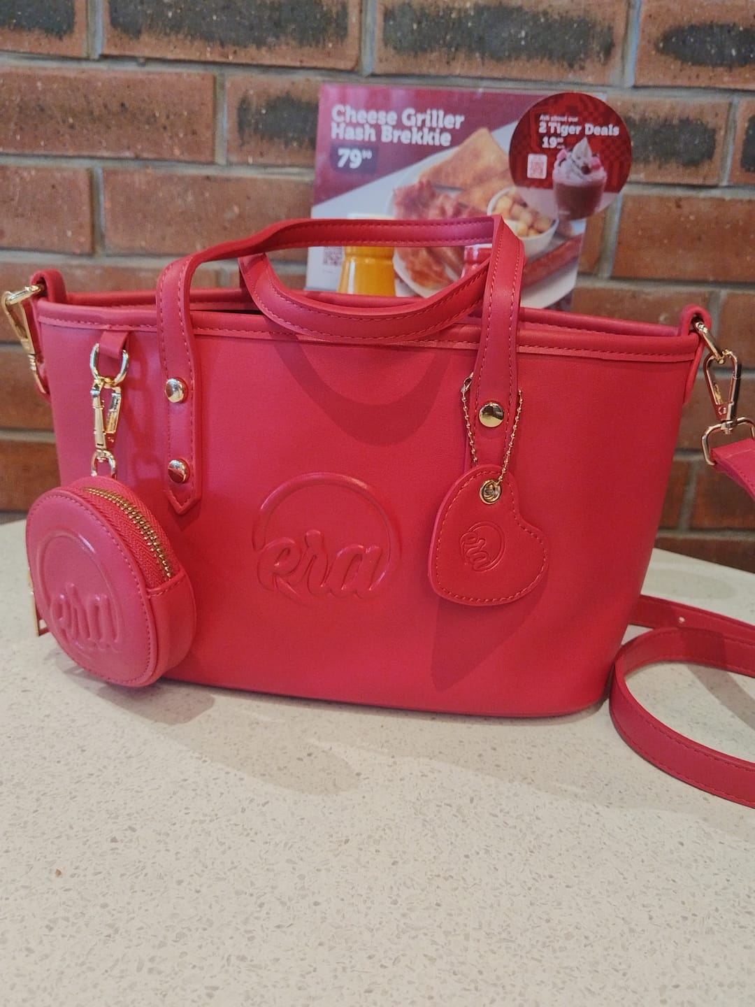 Customer photo review of Pink Era Charm Purse