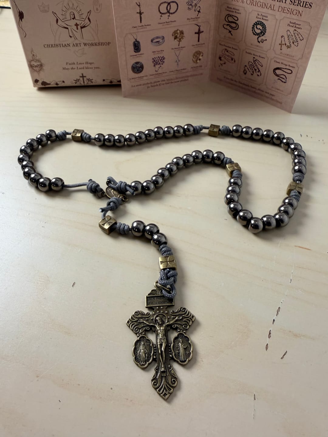 Customer photo review of FREE Today: Miraculous Medal & Crucifix of 8 mm Round Silver Black Gallstone Nylon Cord Rosary