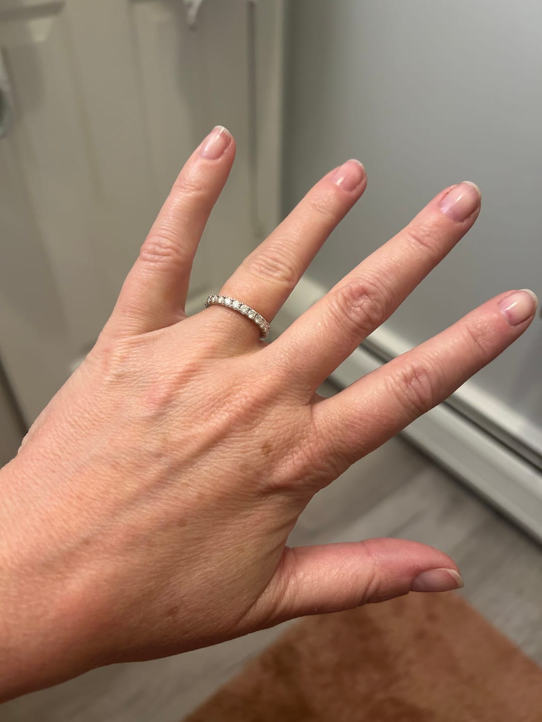 Customer photo review of Pave Moissanite Eternity Wedding Band Ring In Sterling Silver