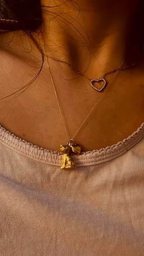 Customer photo review of The Sparkly Eyed Golden Cat Charm (9ct 375 Gold 1970)