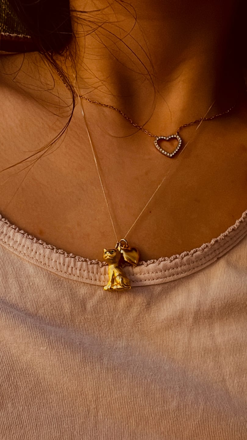 Customer photo review of The Sparkly Eyed Golden Cat Charm (9ct 375 Gold 1970)