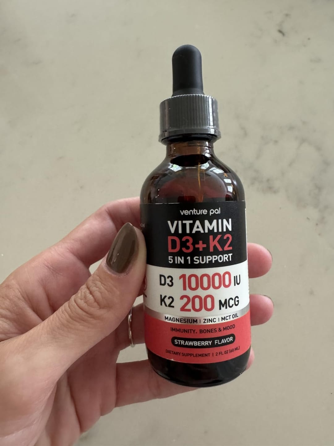 Customer photo review of Vitamin D3 10000 IU Plus K2 (MK-7) - Strawberry Flavor - 200 mcg Liquid Drops