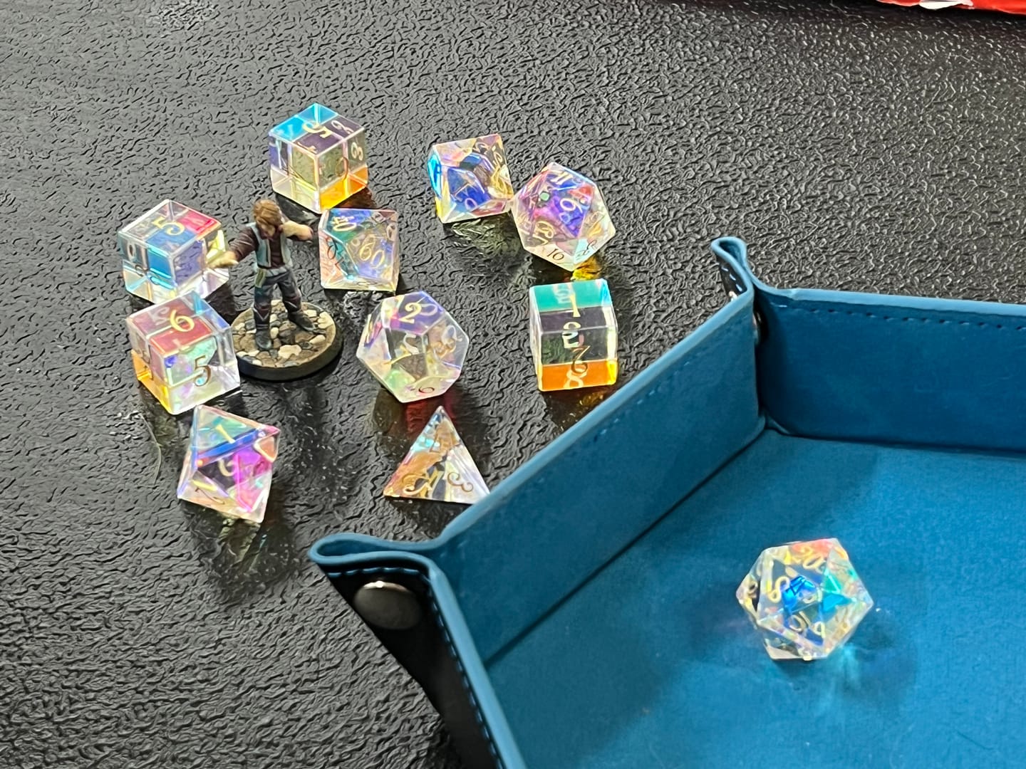 Customer photo review of URWizards D&D Dichroic Prism Glass Gemstone Engraved Dice Set