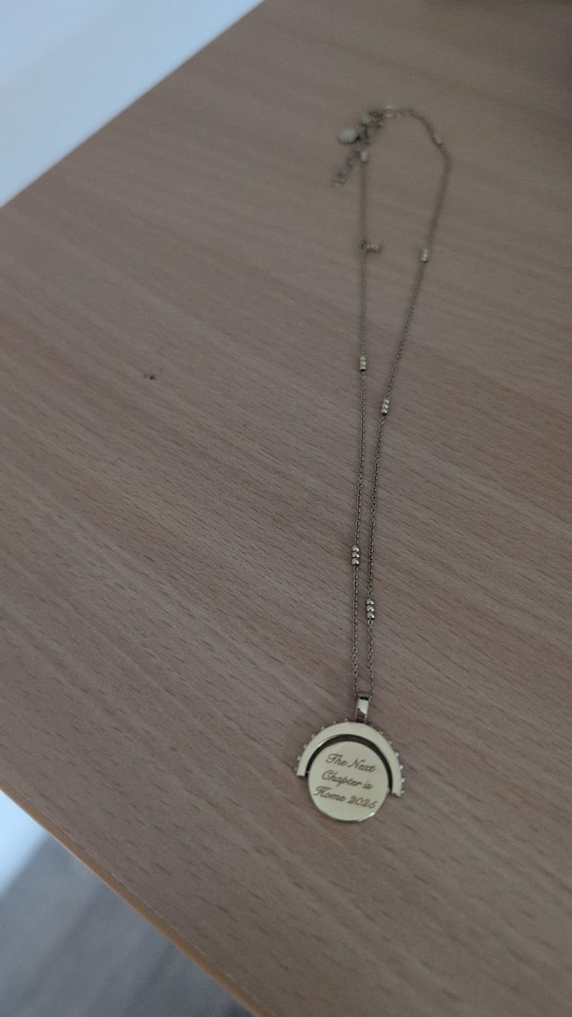 Customer photo review of Engravable Spinning Necklace
