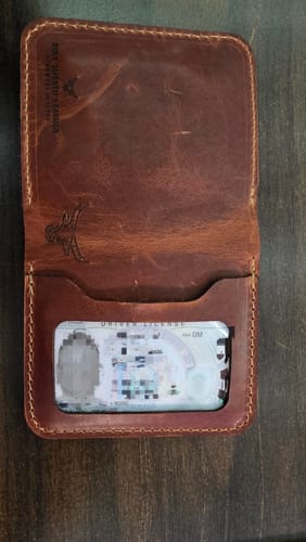 Customer photo of minimalist badge wallet