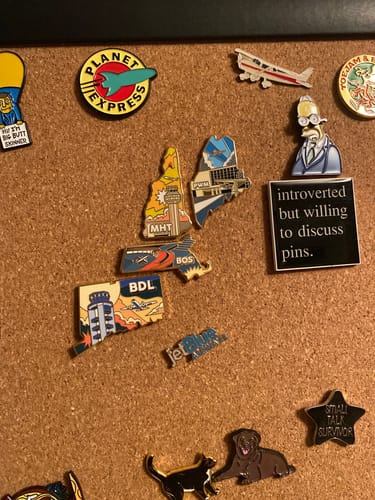 Customer photo review of Airport Enamel Pin | BOS - Massachusetts