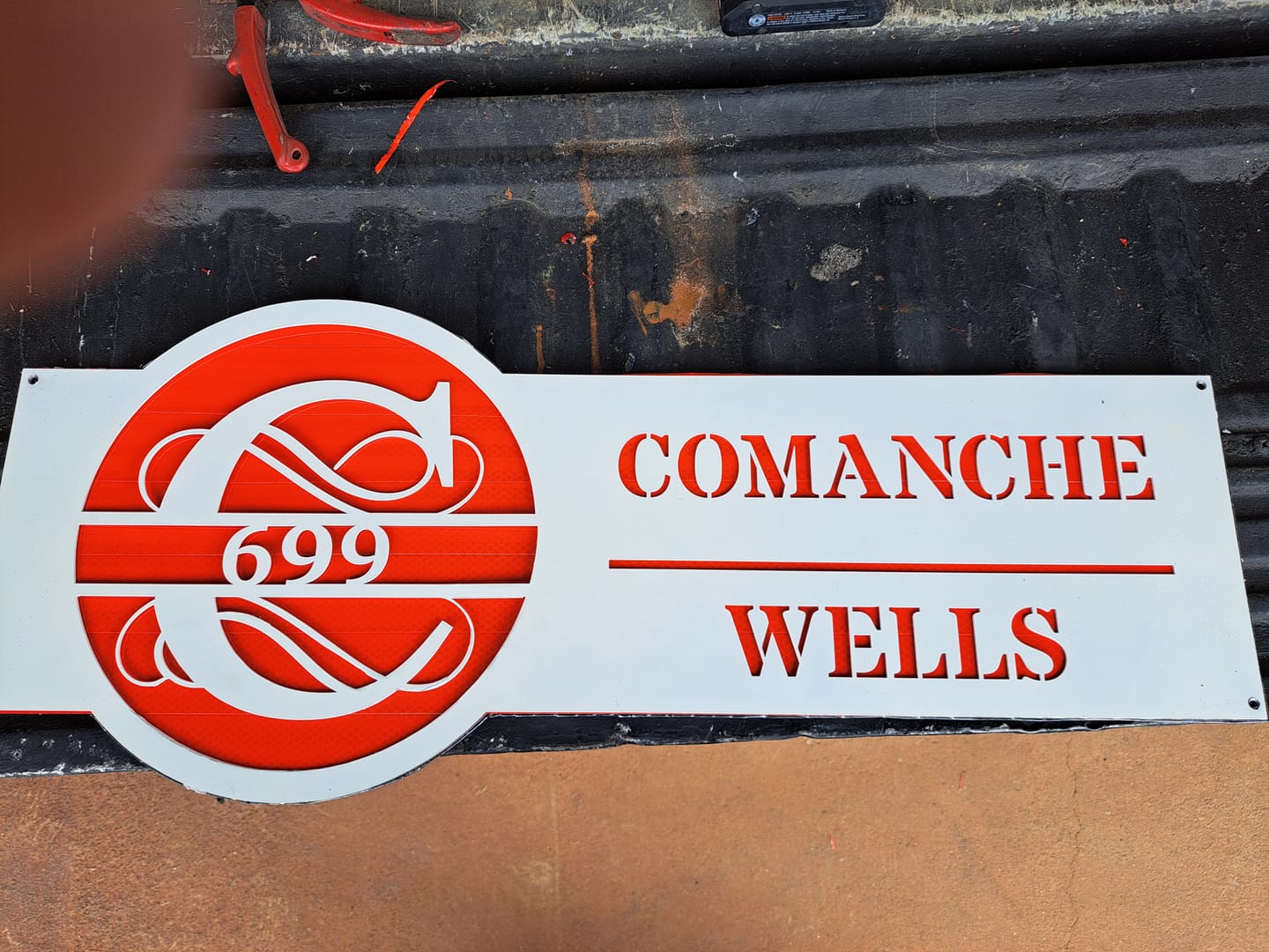 Customer photo review of Family Name Address Metal Sign