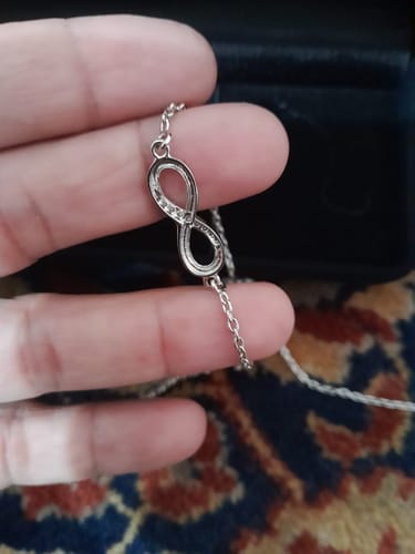 Customer photo review of INFINITY SIGN NECKLACE