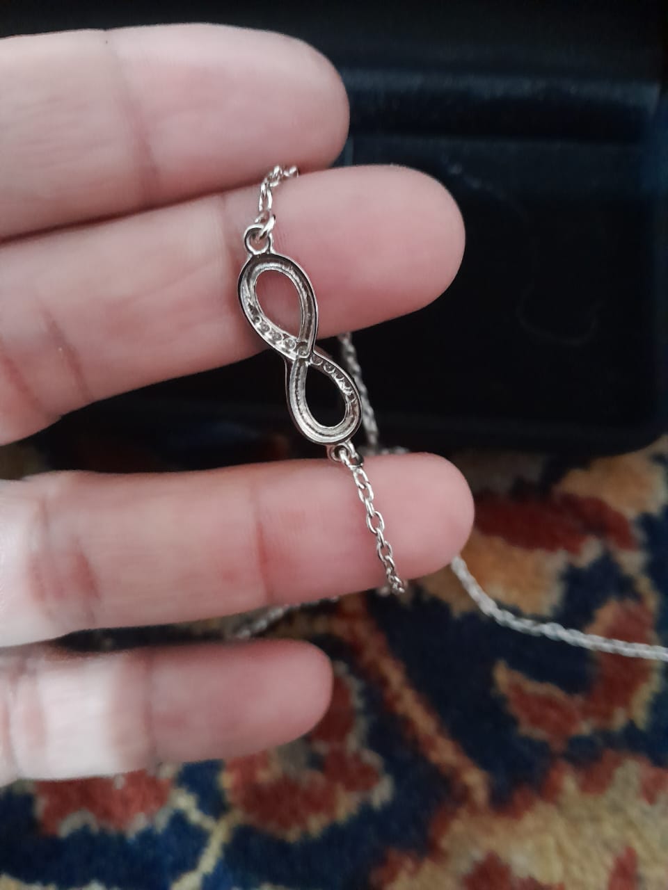 Customer photo review of INFINITY SIGN NECKLACE