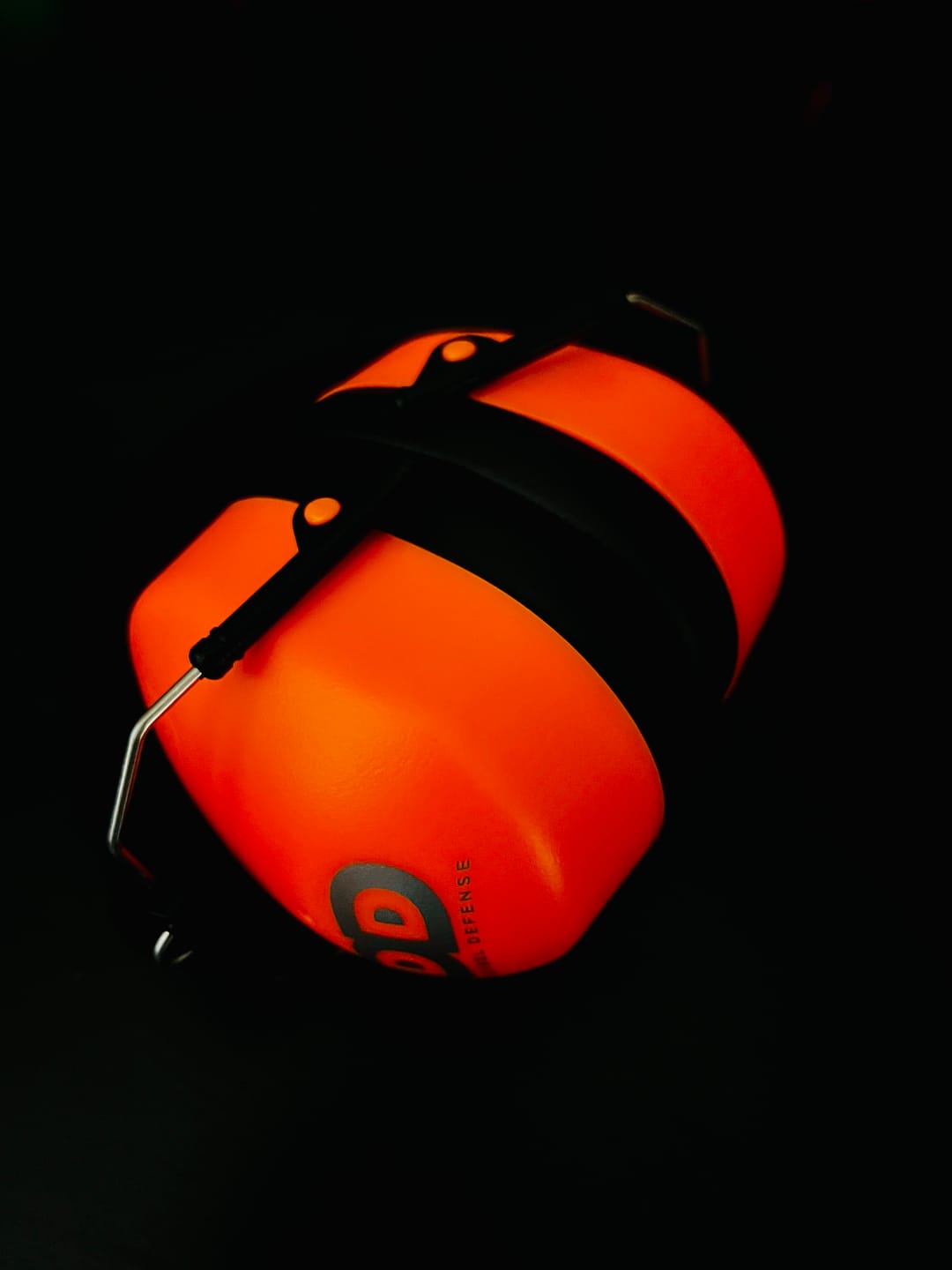 Customer photo review of Decibel Defense Safety Earmuffs in Hi-Visibility Orange