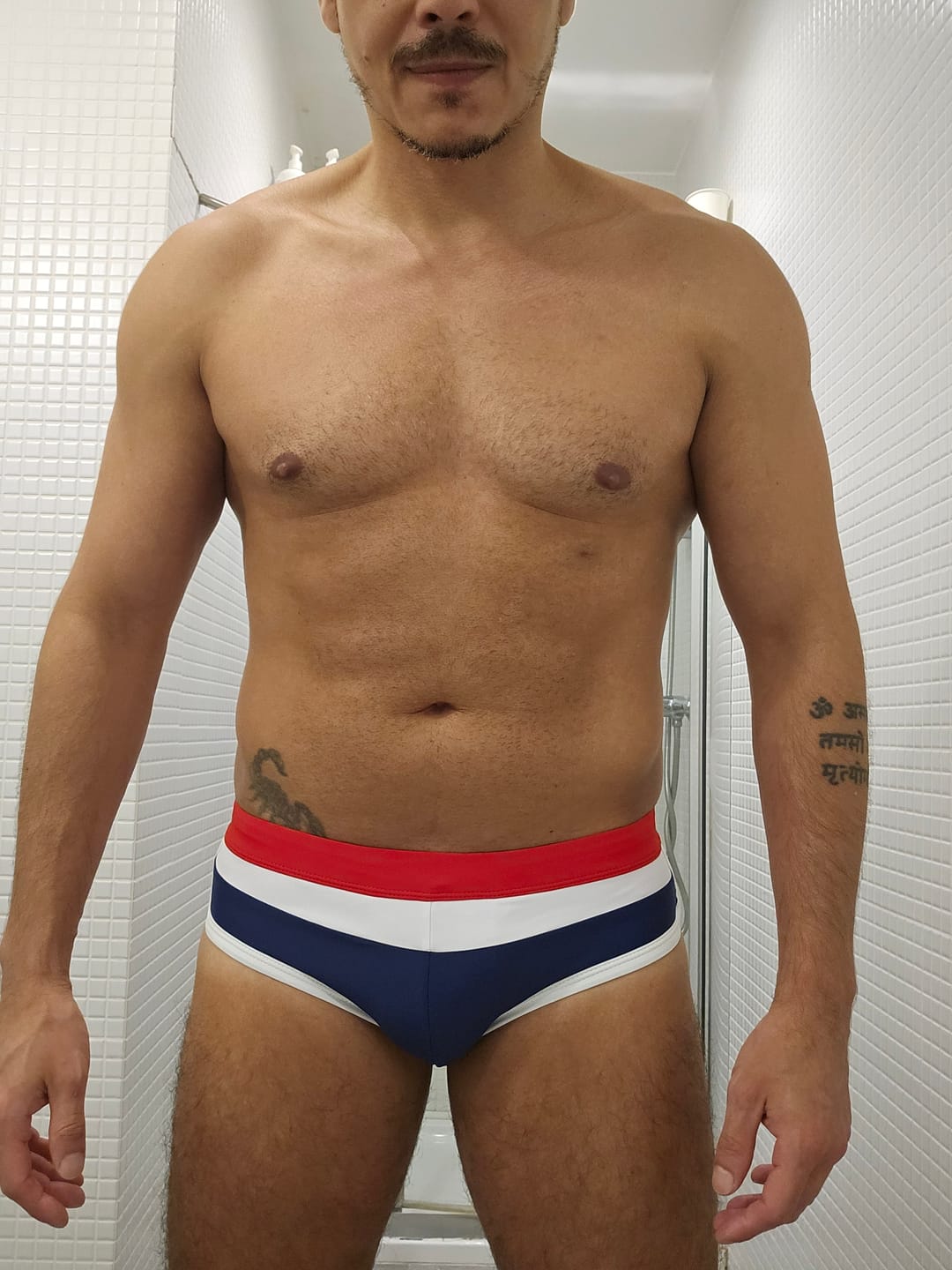 Customer photo review of Men's Nautical Stripe Swim Briefs with Removable Pad