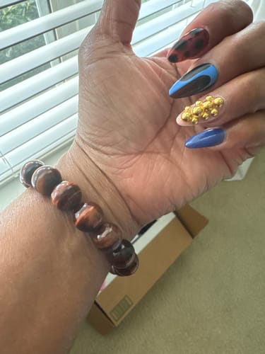 Customer photo review of 15.5" Natural red tiger eye 6mm/8mm/10mm/12mm AA round beads