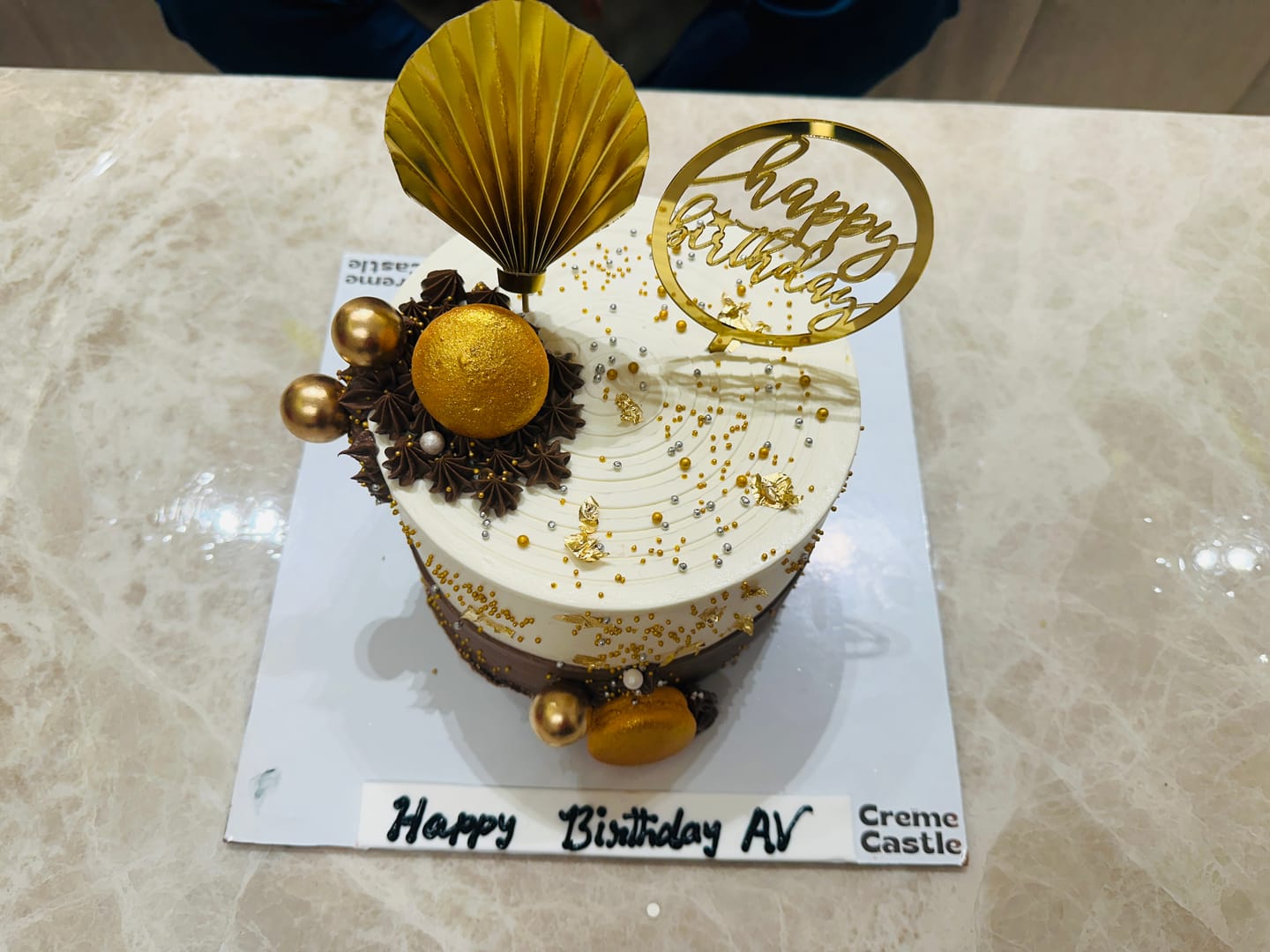 Customer photo review of Golden cake for boyfriend birthday