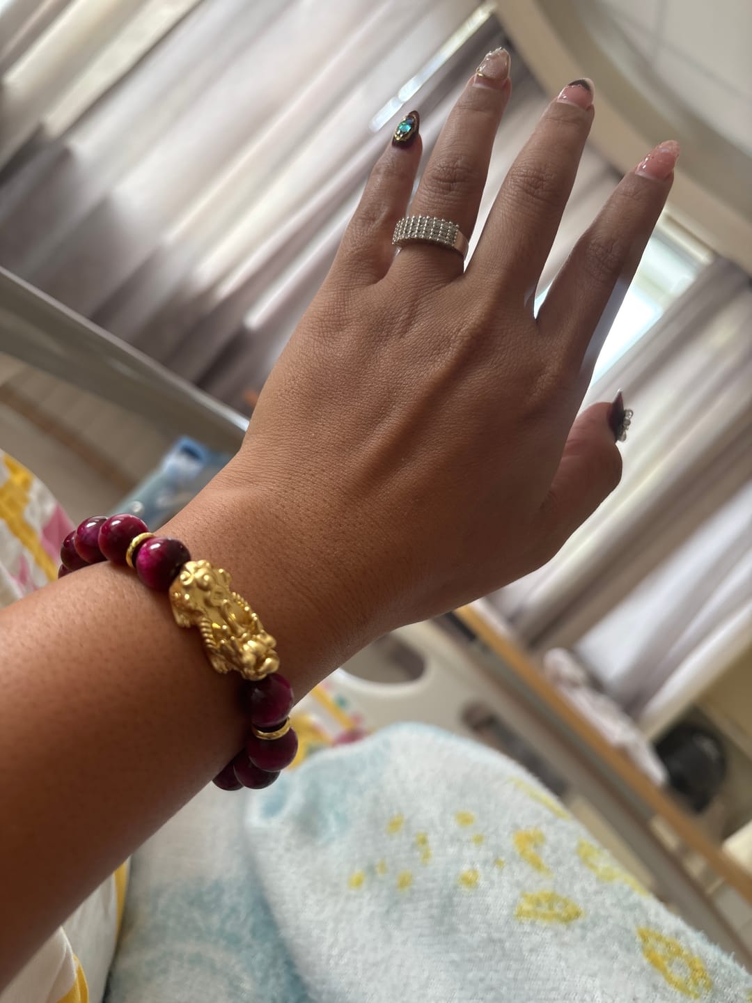 Customer photo review of Magenta Tigers Eye w/ 24k PiYao for Money Love-Courage-Money Catcher