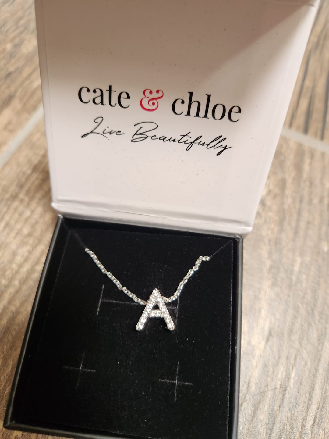 Customer photo review of Ethereal Collection 18k White Gold Plated Initial Letter Pendant Necklace with Swarovski Crystals