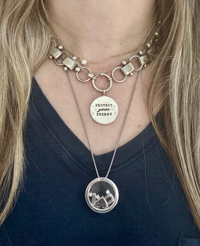 Customer photo review of Protect Your Energy Silver Round Charm