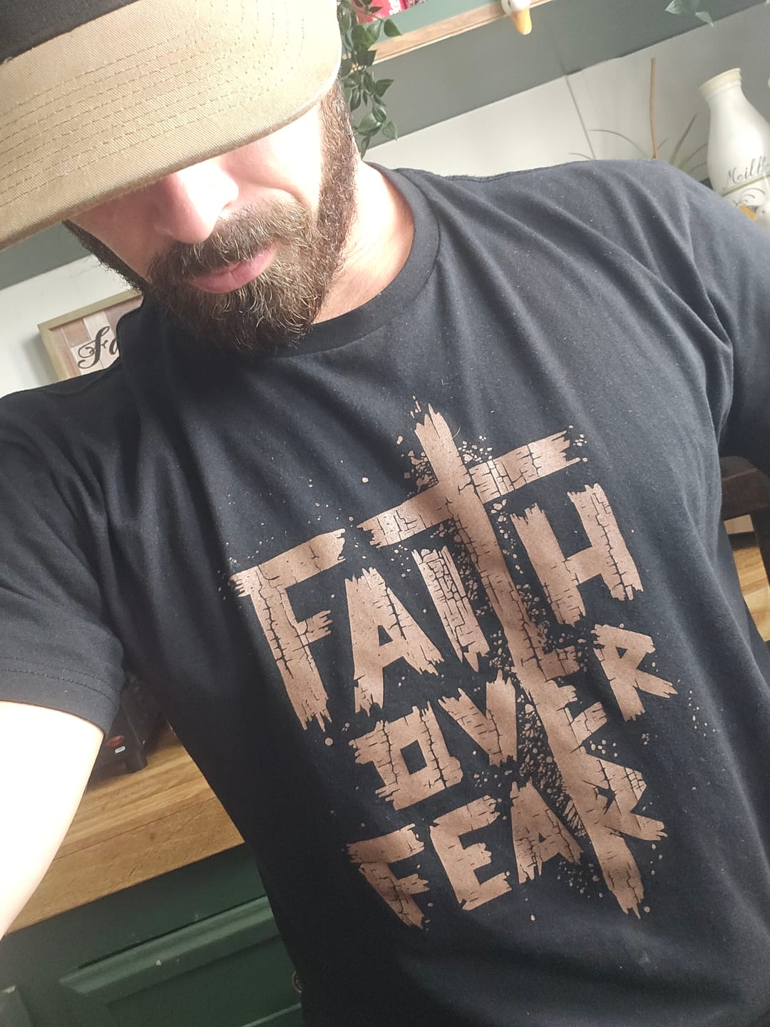 Customer photo review of Faith Over Fear Tee