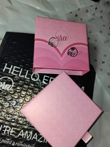 Customer photo review of Silver Era Logo Studs