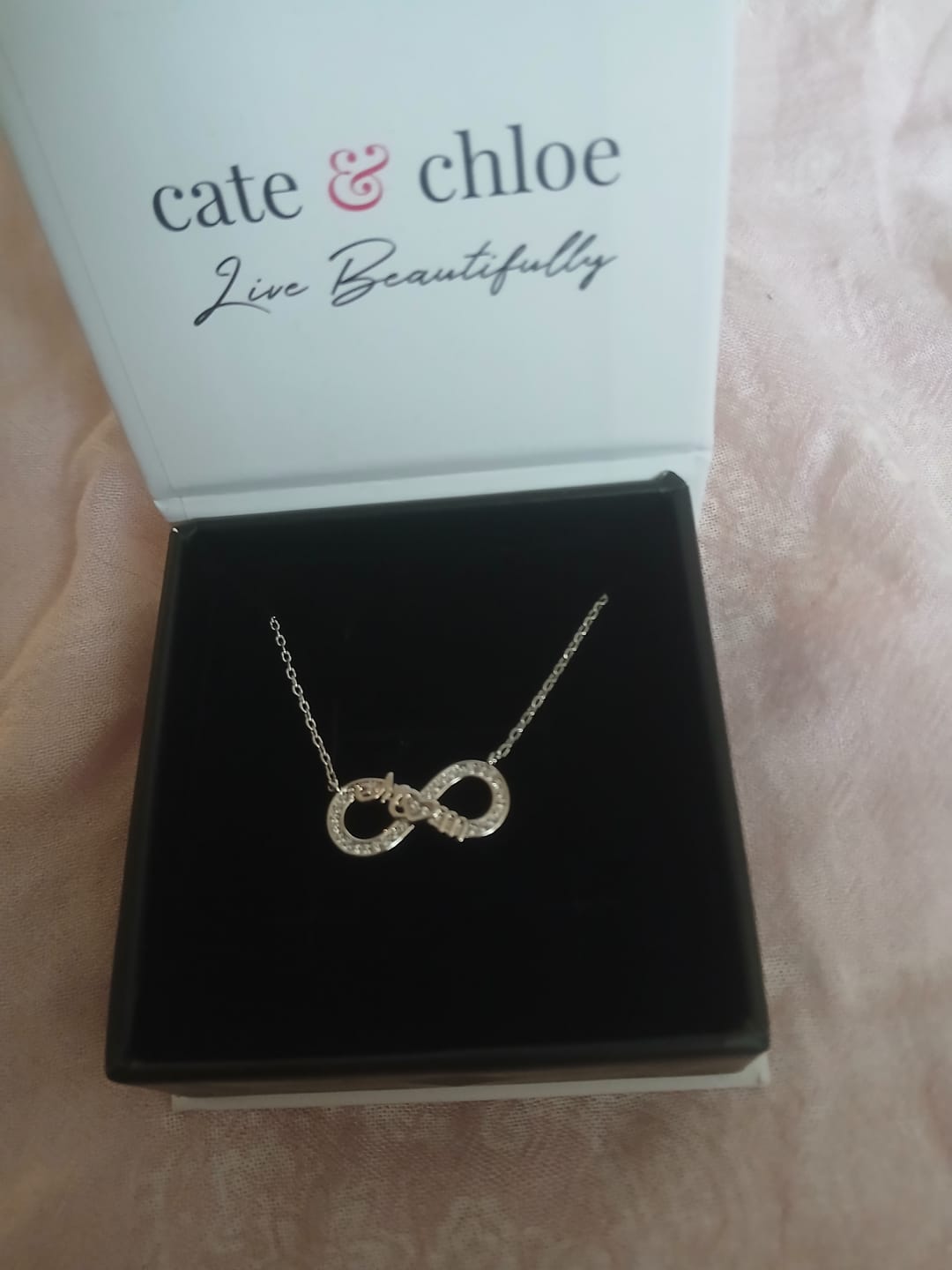 Customer photo review of Robin 18k White Gold Plated Mom Infinity Necklace with Swarovski Crystals
