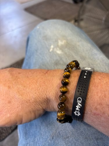 Customer photo review of Tiger's Eye Battle Beaded Bracelet: Helps Pair Veterans With A Service Dog Or Shelter Dog