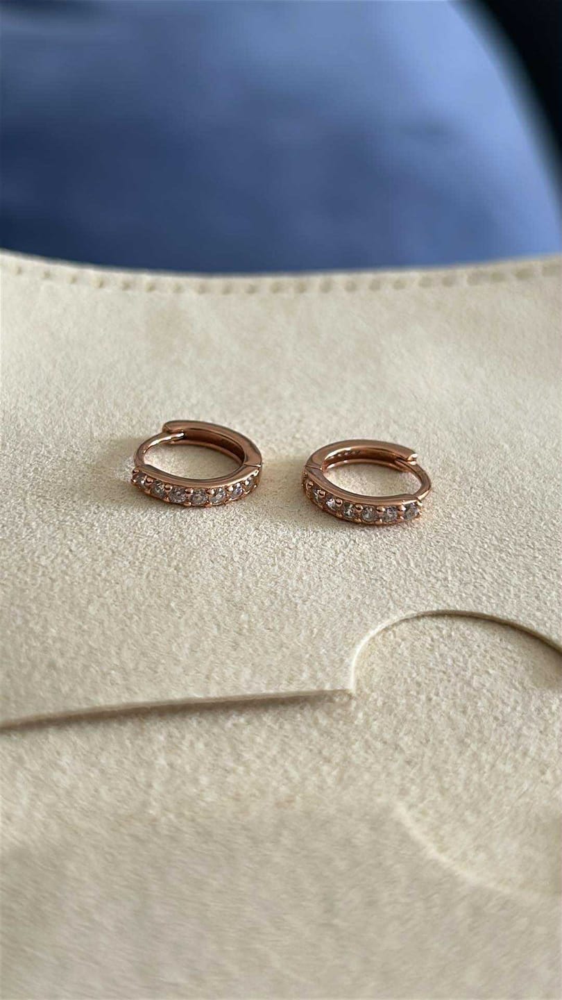 Customer photo review of Basic Sapphire Huggie Hoop Earrings