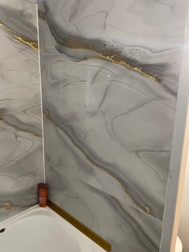 Customer photo review of Panneau Mural PVC Imitation Marbre Doré - Facile A poser