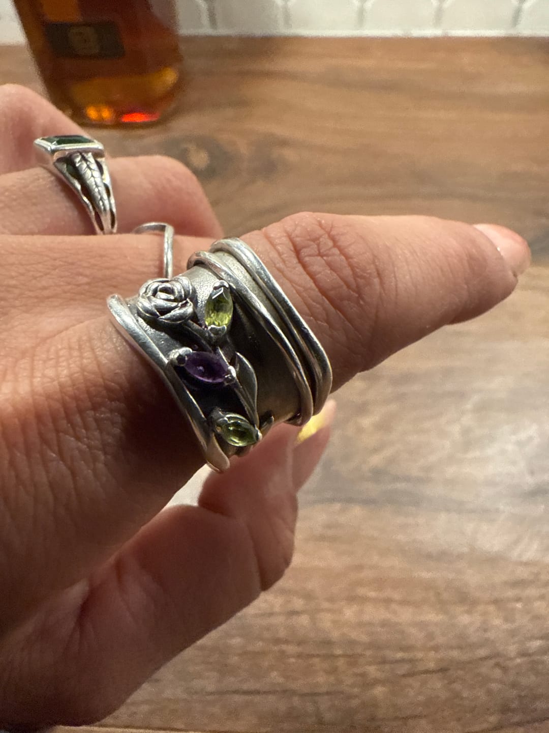 Customer photo review of Rose Flower Fidget Ring with Green and Purple Amethyst