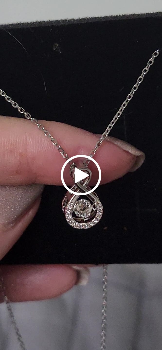 Customer video review of Martha 18k White Gold Plated Infinity Dancing Pendant Necklace with Swarovski Crystals