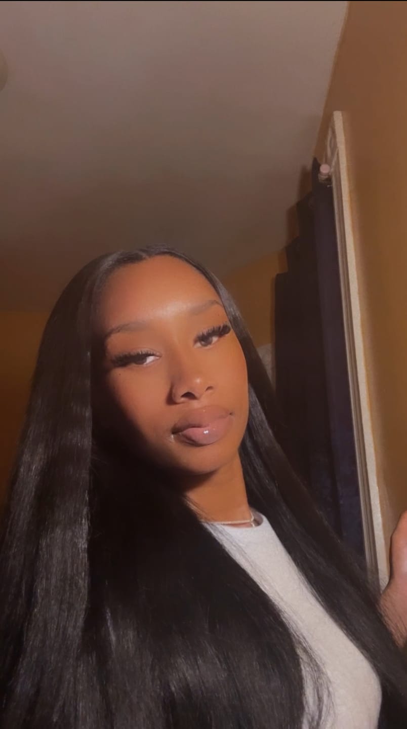 Customer photo review of Seamless Clip In Hair Extensions Kinky Straight