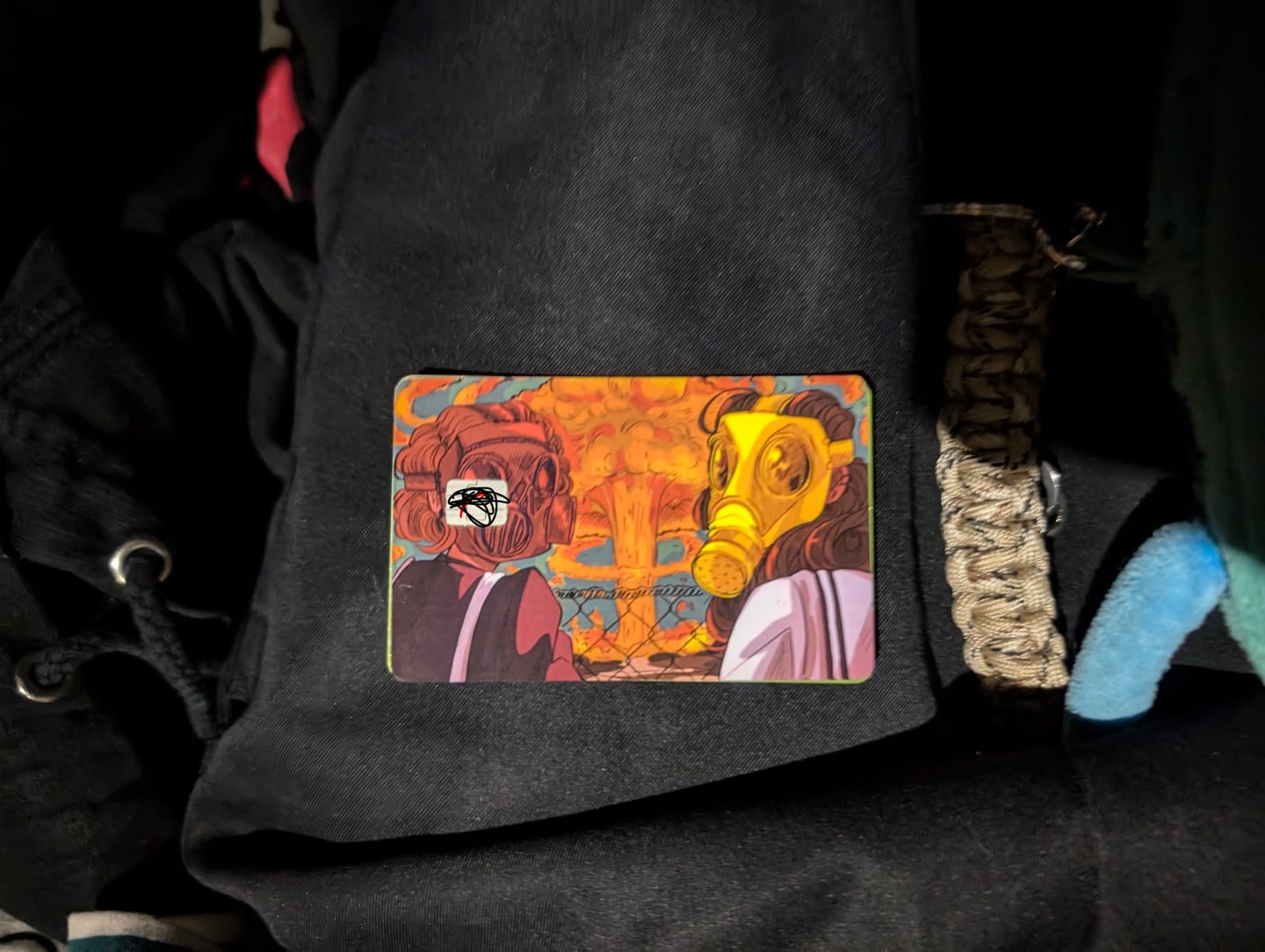 Customer photo review of Gas Mask Girls Credit Card Skins