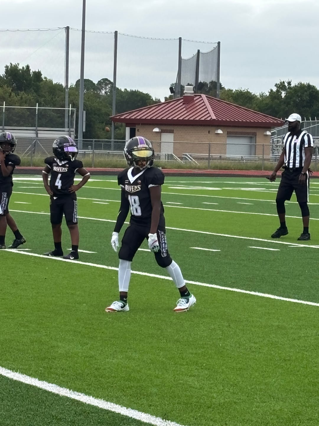 Customer photo review of The Officially Licensed Joker Youth Football Cleats - Velocity 2.0 by Phenom Elite