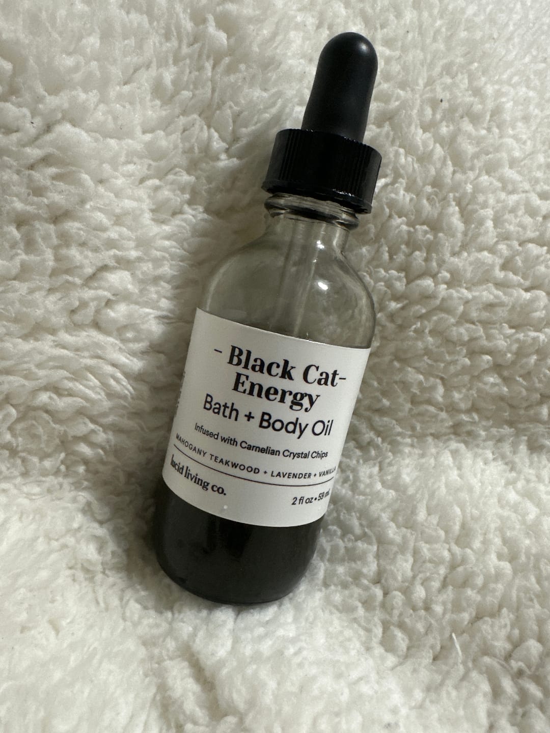 Customer photo review of Black Cat Energy Bath & Body Oil
