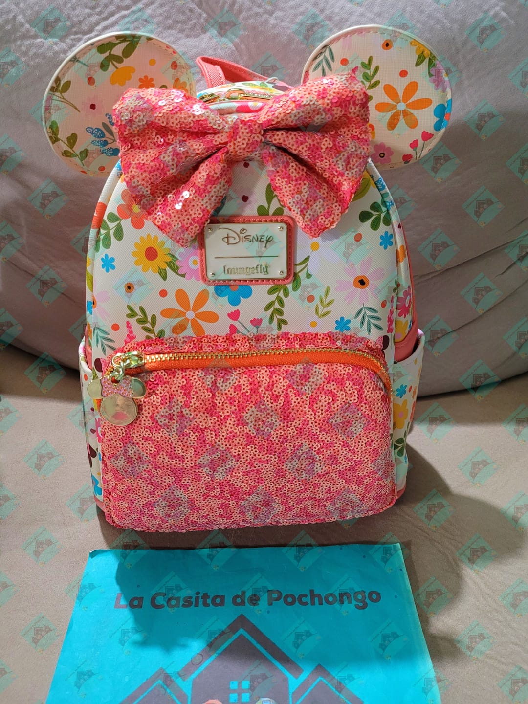 Customer photo review of Loungefly Disney Minnie Mouse Springtime Sequins Mini Backpack - 707 Street Exclusive