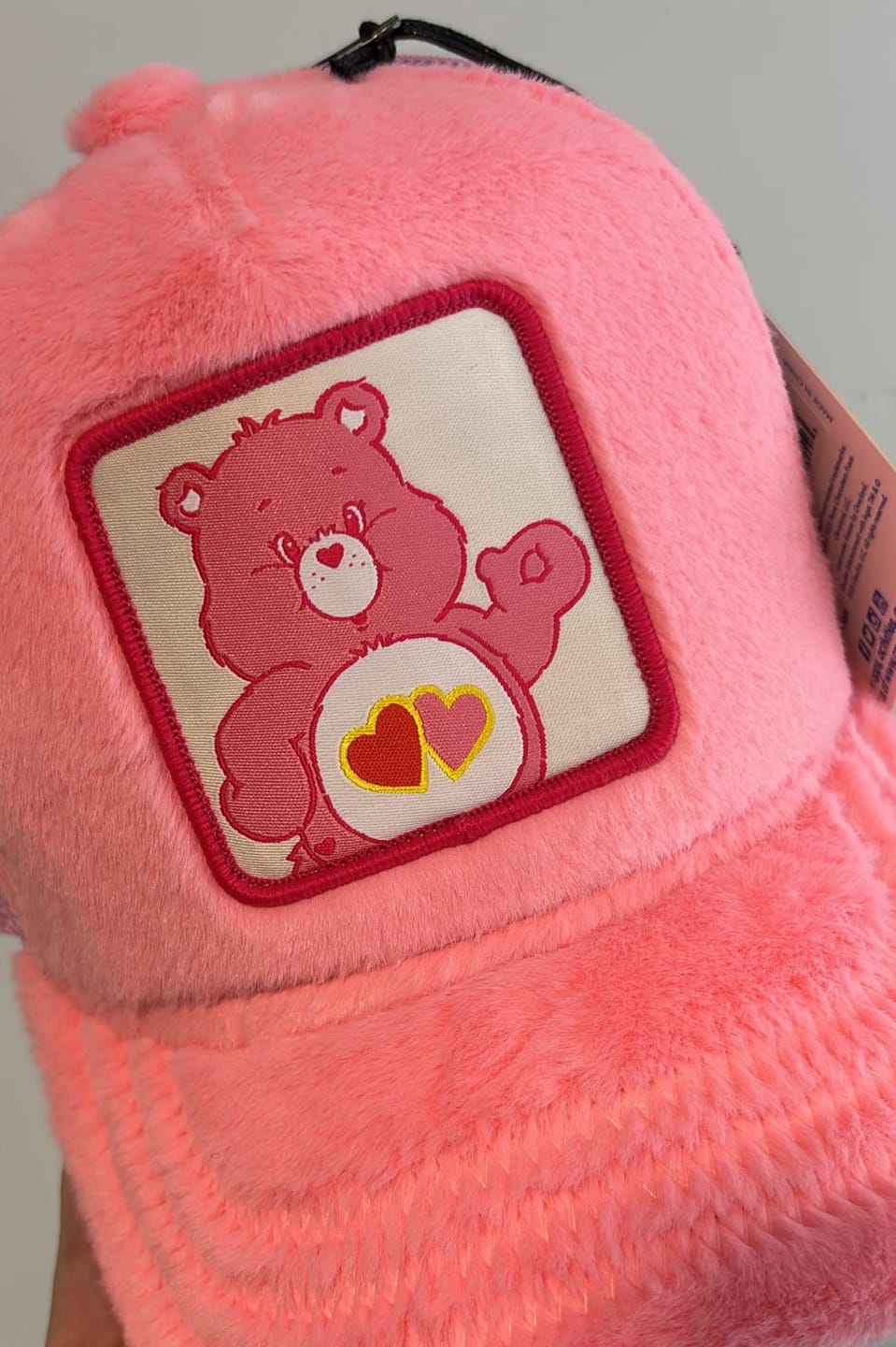 Customer photo review of OVERLORD X Care Bears:  Love-A-Lot Bear Trucker Cap