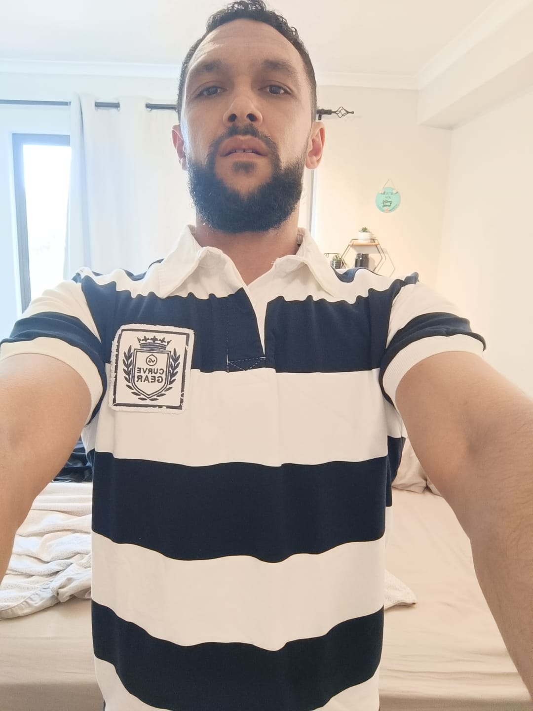 Customer photo review of Elite Rugby Polo Navy & Off White Thick Stripe